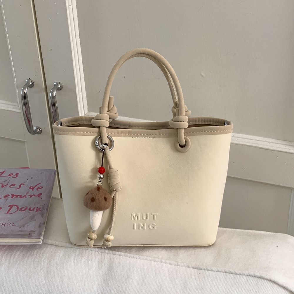 高级感小众水桶包女手提小拎包2026春季新款时尚百搭日常通勤斜挎