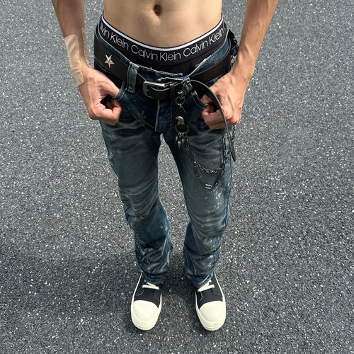 OC水洗泼墨微喇排扣视觉系牛仔裤