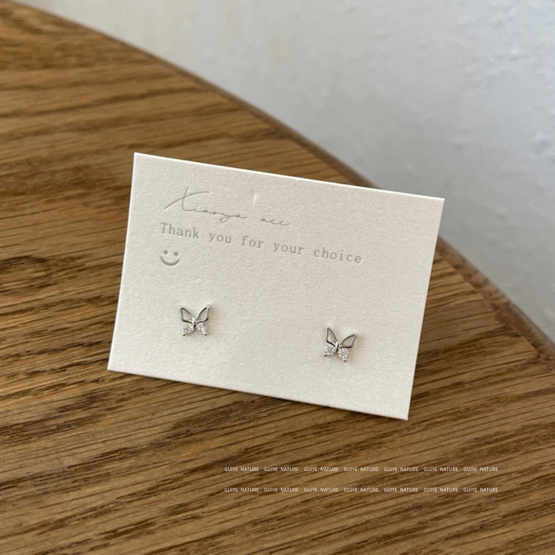 归野银色迷你镂空蝴蝶耳钉女