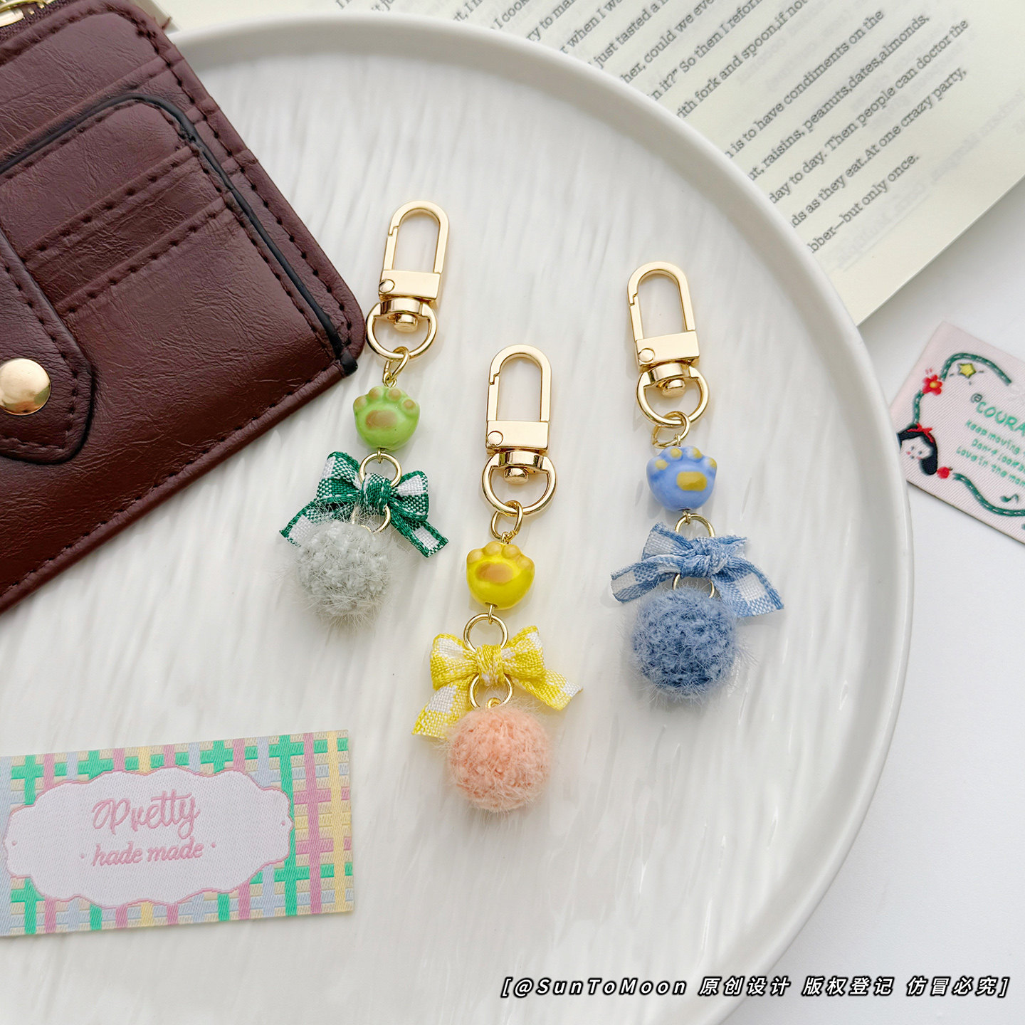 治愈系猫爪蝴蝶结毛球钥匙扣糖果色简约包包挂件AirPods拉链配饰