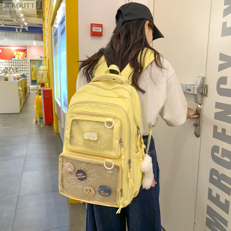 痛包双肩女黄色2026新款初中高中生书包大容量女生透明层背包肩包