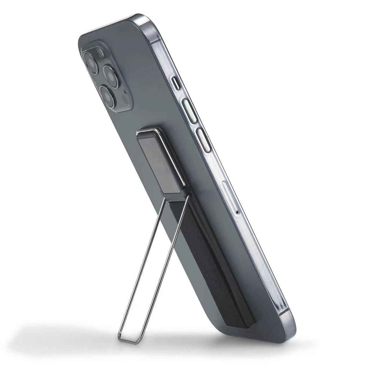 手机防滑手带横竖可立支架编织弹力带子松紧磁吸桌面粘贴男女通用