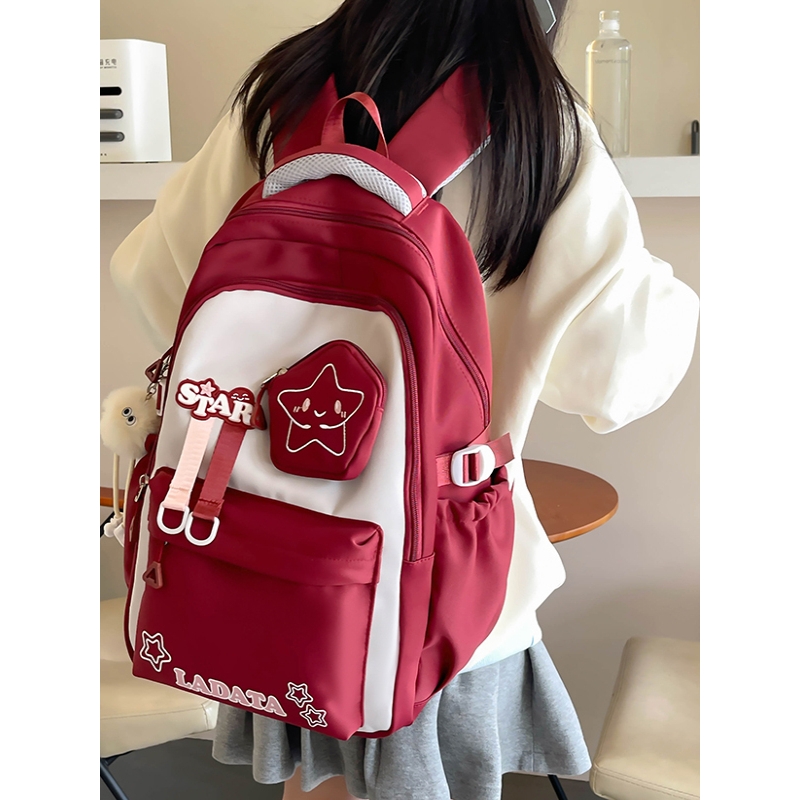 法国书包女生小学生三到六年级减负护脊超轻便大容量初中生双肩包