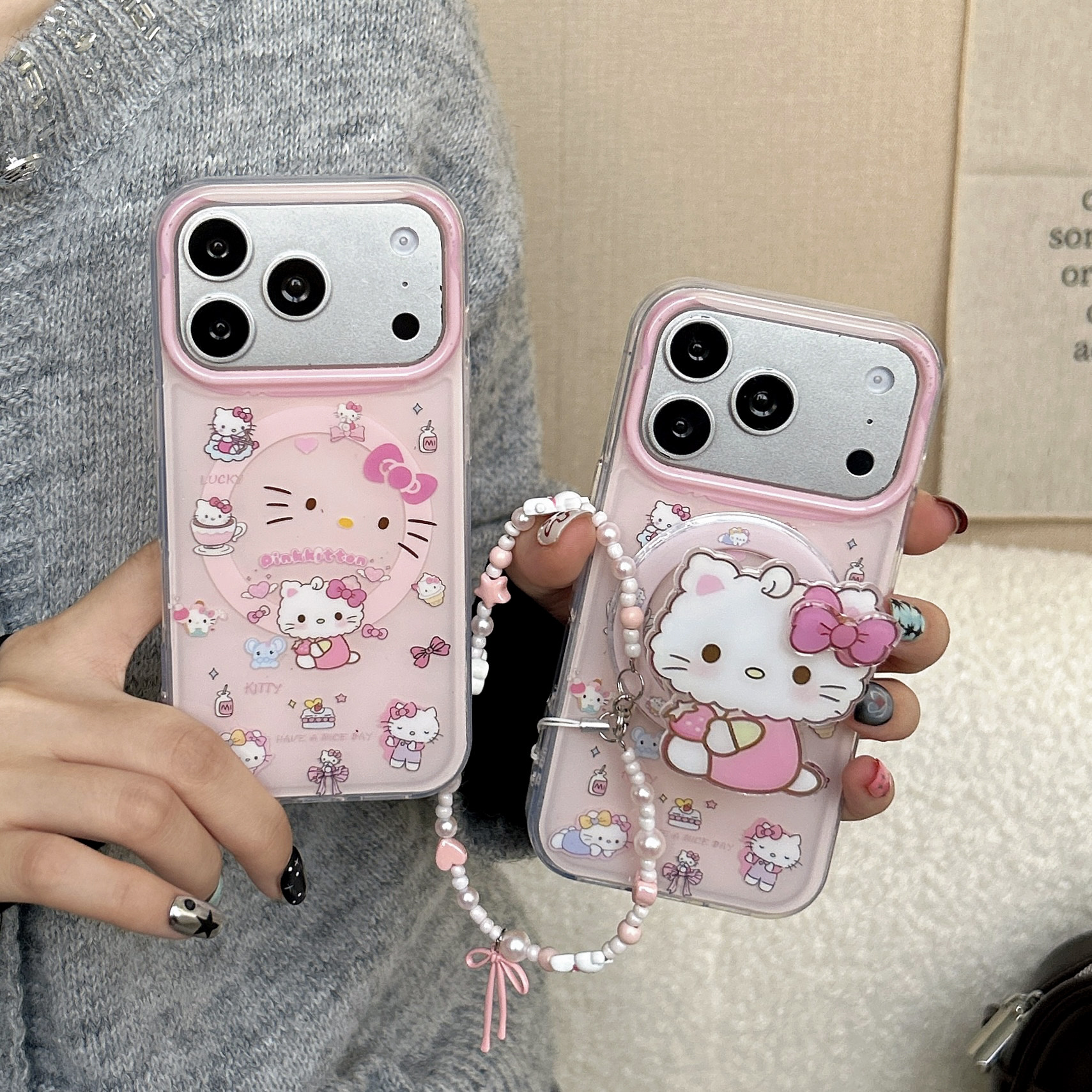 日本粉色卷毛HelloKitty抱草莓磁吸适用苹果17promax手机壳15全包按键大视窗14/13创意磁吸吸架挂绳壳16保护