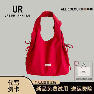 UR原创新款韩版清新尼龙帆布托特包女2026小众蝴蝶打结单肩腋下包