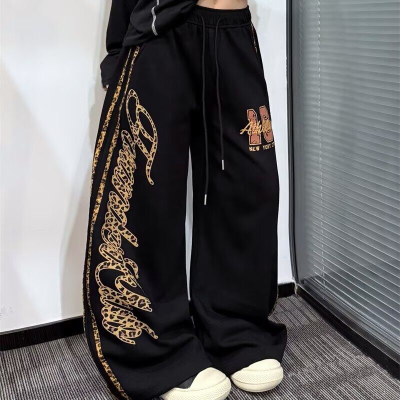 胖风黑色特大码女豹纹牛仔裤bf女装慵懒阔腿mm裤子宽松拼接300斤