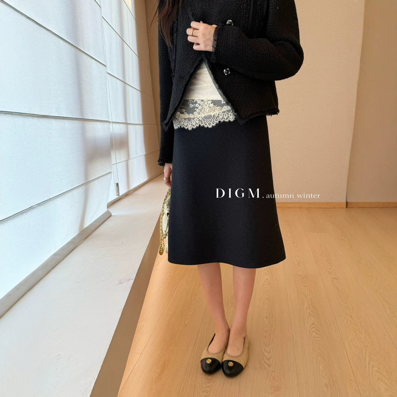 冬上新【DIGM】极简高级感简约百搭通勤纯色高腰a字摆半身裙