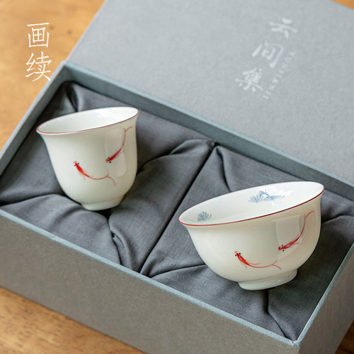 白瓷手绘鱼戏主人杯单杯