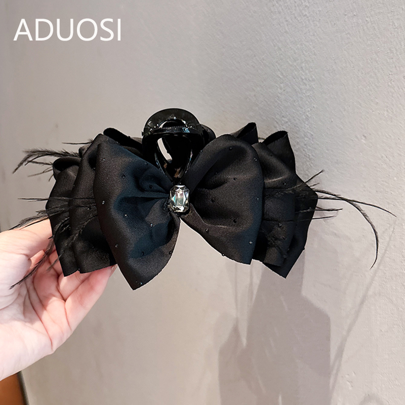 高级感缎面羽毛蝴蝶结抓夹2025新款后脑勺盘发夹头饰显发量鲨鱼夹
