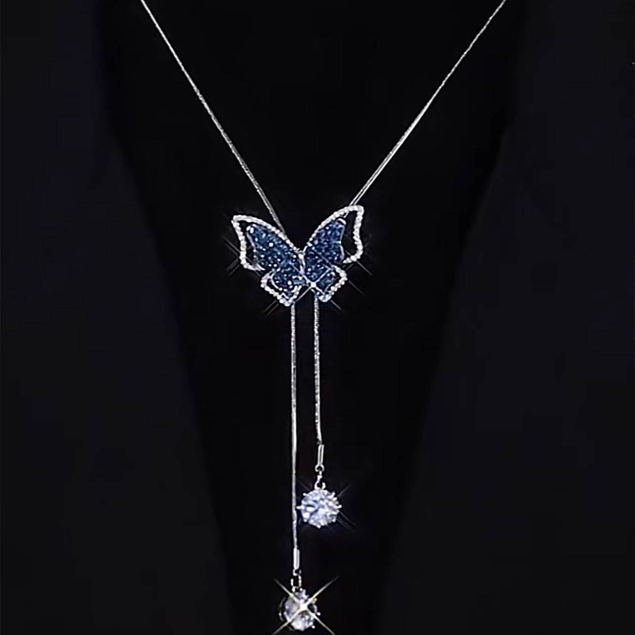 高级感镶钻蓝色蝴蝶项链女秋冬新款潮高级感可抽拉长款流苏毛衣链