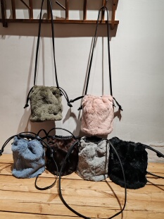 出口日本獭兔毛真毛真皮女款休闲通勤复古时尚手提斜挎桶包