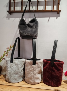 出口日本美丽奴羊毛皮毛一体水桶真皮真毛女单肩手提包