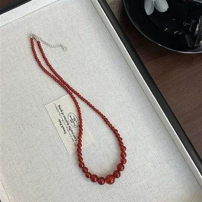 Yuanyou gradient light luxury white red agate New Year