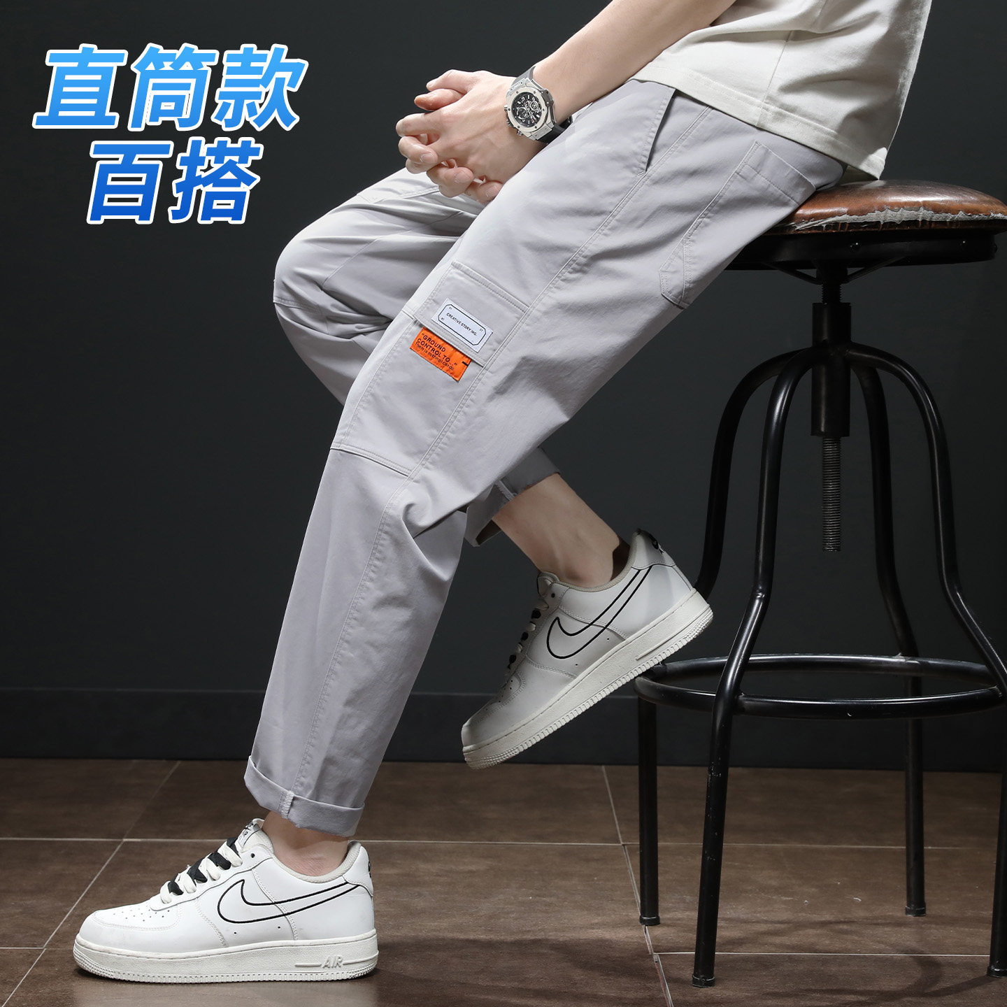 啄木鸟青春活力风男士休闲裤2026春季宽松直筒微弹工装裤口袋设计