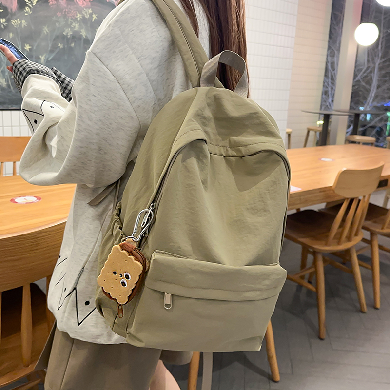 纯色书包女初中生韩版日系简约小学生双肩包大学生休闲学院风背包