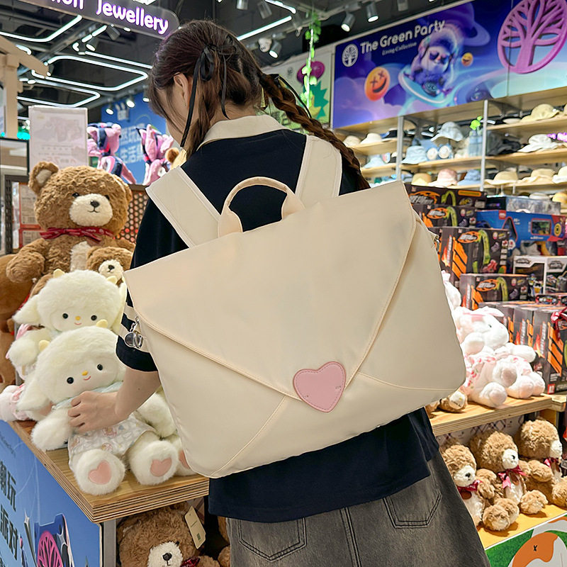 14寸手提单肩包爱心信封包