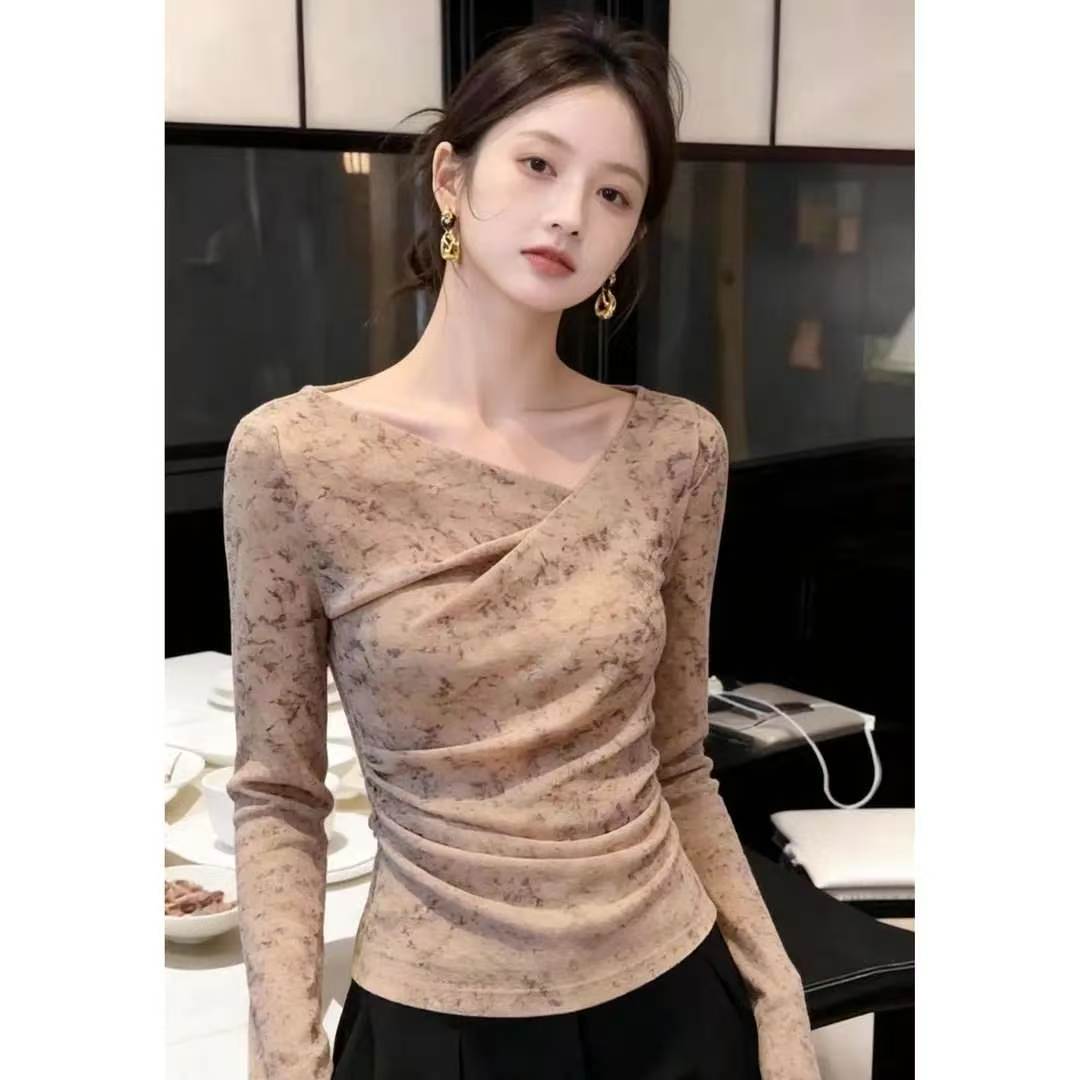 卡其色扭结T恤女春秋欧货复古风收腰修身轻熟小众不撞款长袖上衣