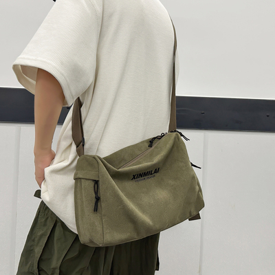 复古帆布包斜挎包男款单肩包大容量旅行运动健身包男士潮牌邮差包