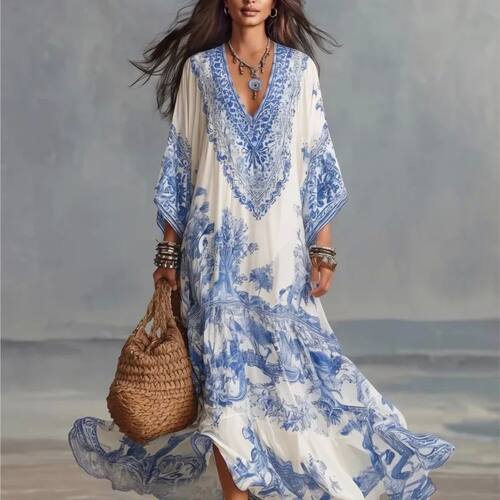 V领印花长袖衬衫连衣裙V-neck printed long sleeved loose dress