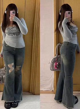 特大码胖mm蓝色独特超好看的牛仔裤女辣妹风破洞毛边弹力微喇裤子