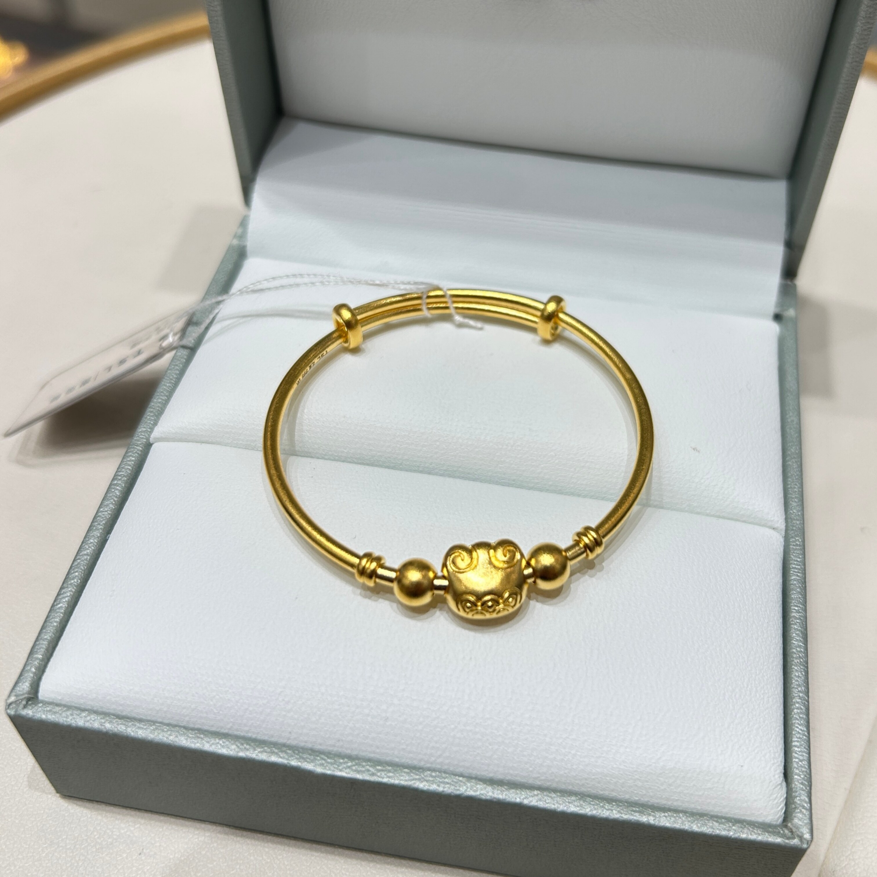 TSL谢瑞麟代购 足金999祥云纹猫耳朵福袋黄金宝宝手镯 儿童推拉镯