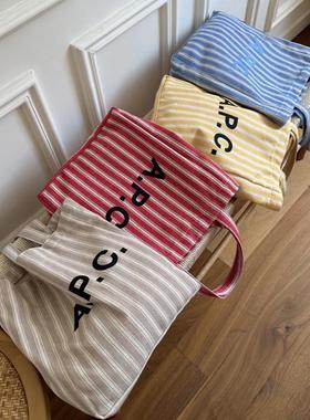 APC字母简约通勤单肩帆布包新款夏季拼接条纹百搭包大容量帆布包