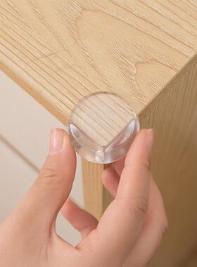 A pack of four child safety corner guards for tables and cof