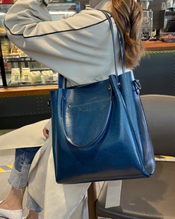 托特包大包女2025新款潮水桶包网红爆款多分层高级感通勤真皮女包