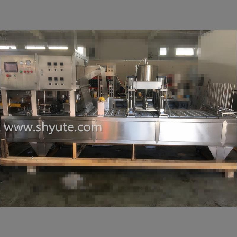 全自动塑杯灌装封口机，广泛用于酸奶酱料颜料等液体等包装