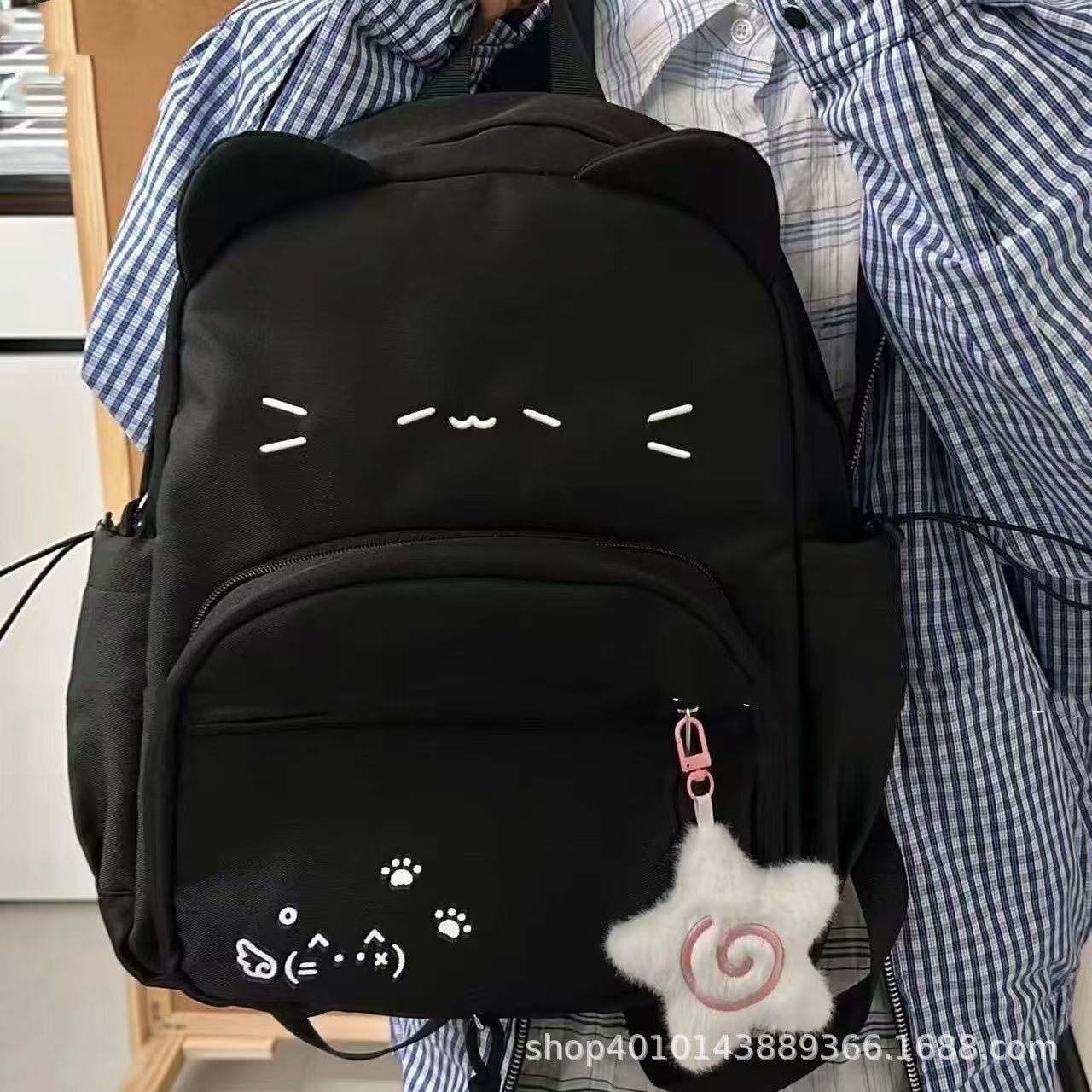 新款黑猫双肩背包书包带痛层耳朵