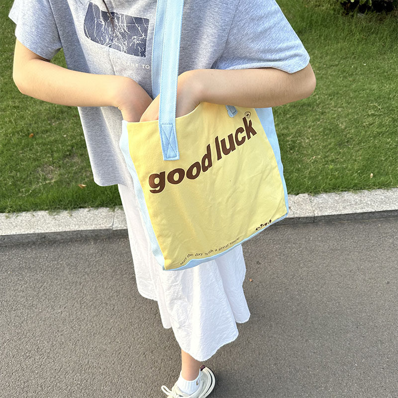 学院风帆布托特包包女2025新款潮时尚休闲美式校园大容量单肩包,箱包皮具/热销女包/男包,时尚帆布包,淘宝优惠券,粉丝福利购,淘宝优惠卷