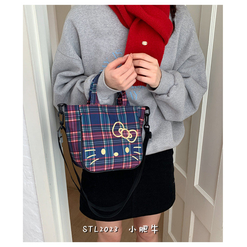 韩系学院风复古小众格子斜挎包包女百搭水桶包休闲通勤单肩手提包