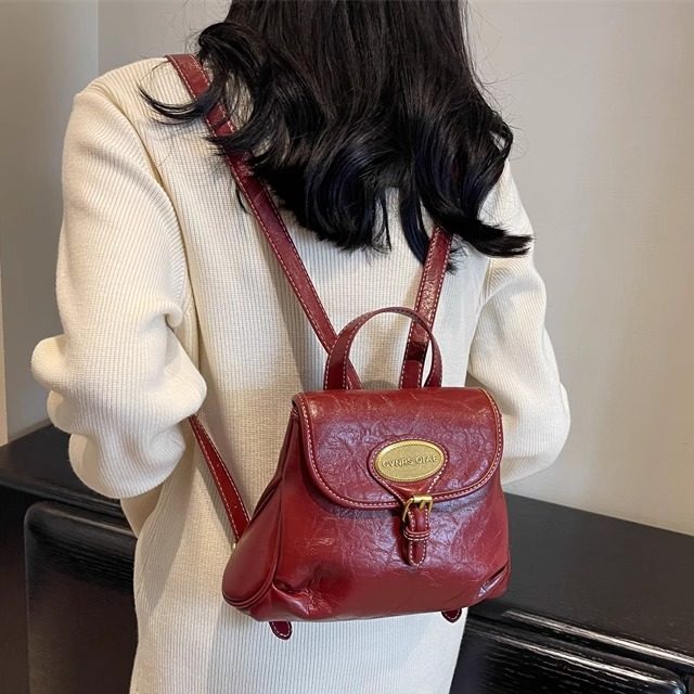 复古文艺酒红色双肩包包女2026新款潮时尚法式小书包简约休闲背包