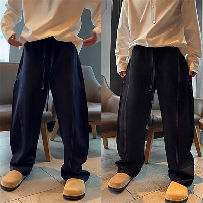 春季阳离子立体剪裁弯刀牛仔裤男