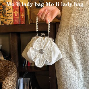 新中式汉服小众珍珠手提五瓣花白色宫廷风旗袍包包仙女手提包女包