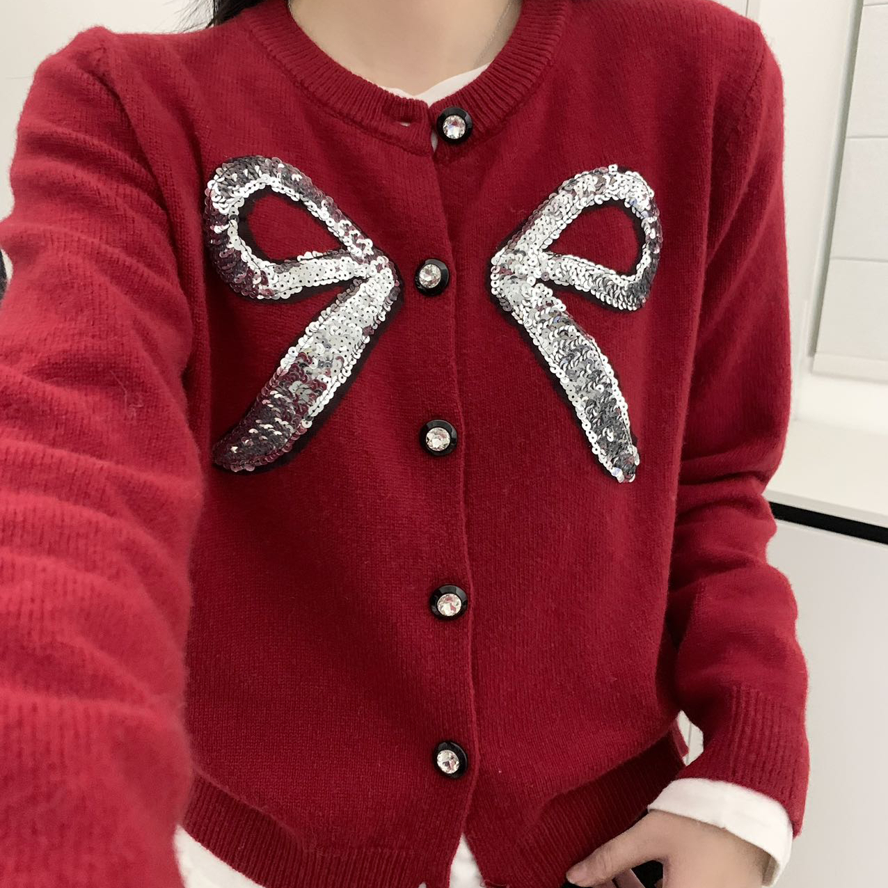 可可-工亮片设计蝴蝶结图案洋气保暖针织开衫(含100绵羊毛)69083