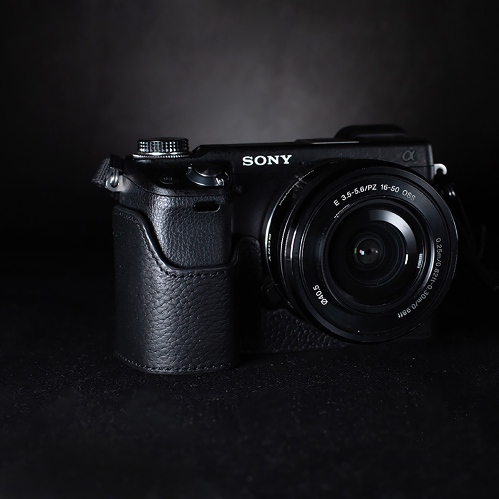 适用SONY索尼NEX6皮套保护套头层牛皮底座NEX7配件微单相机包背带