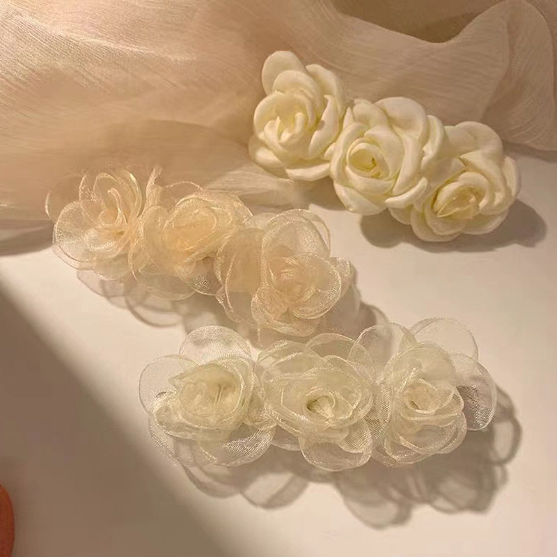 温柔山茶花发夹女森系仙美后脑勺发饰高级感半扎发弹簧夹发卡头饰