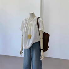 高级感轻奢棉麻短袖上衣女2025夏季新款气质百搭圆领娃娃衫ins