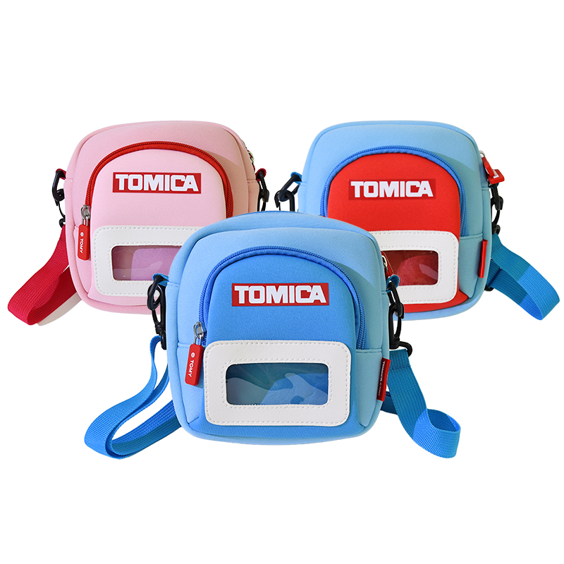 多美卡儿童斜挎包书包防水双层包