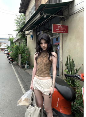 Common in 0120 性感辣妹 RO风结构褶皱半身裙新款低腰包臀短裙