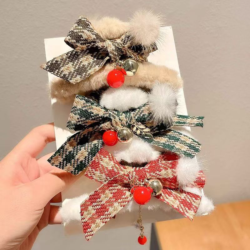 秋冬爆款蝴蝶结抓夹女甜美气质流苏毛绒抓夹毛球鲨鱼夹子盘发抓