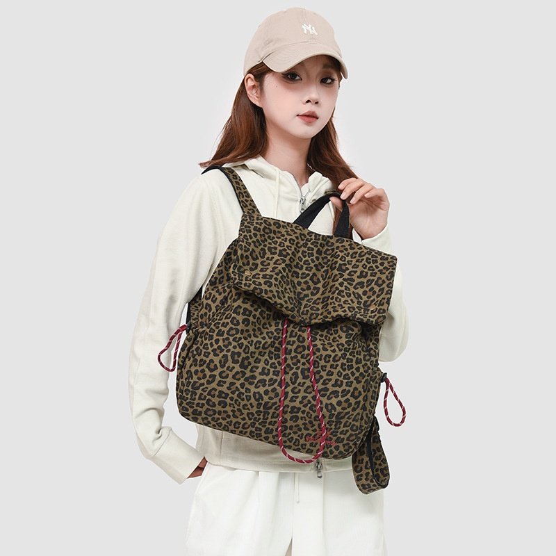 2026新款潮酷豹纹帆布双肩包女休闲大容量旅行背包大学生书包