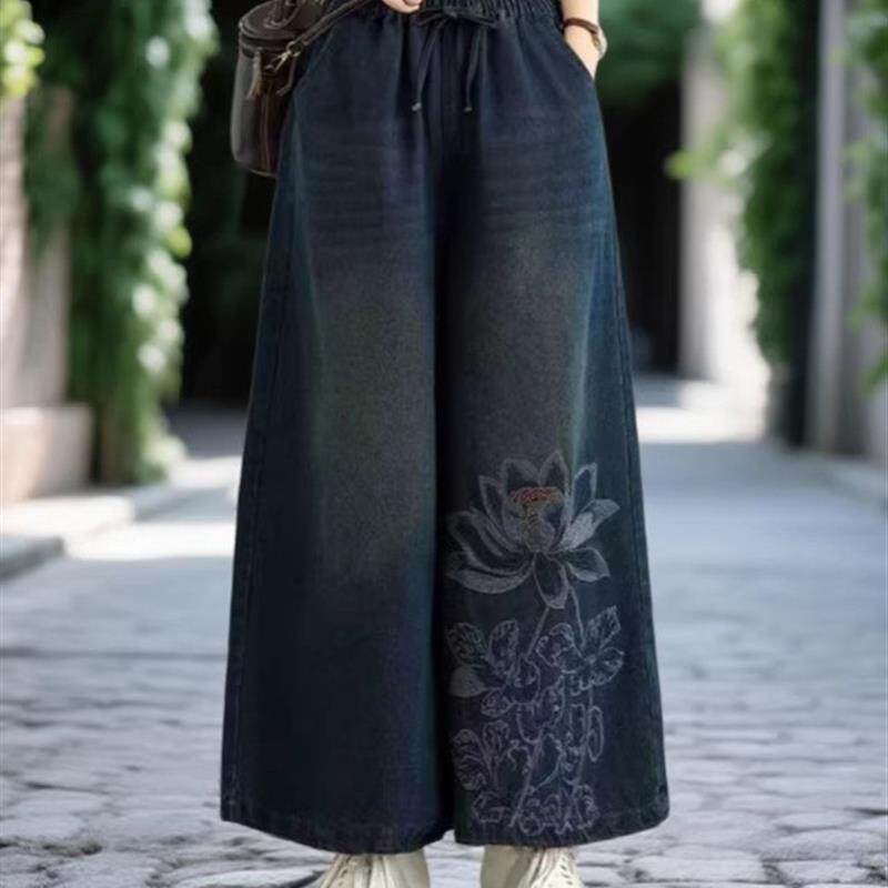 2026春新款刺绣荷花牛仔裤女士时尚大码遮肉松紧腰阔腿裤长裤子