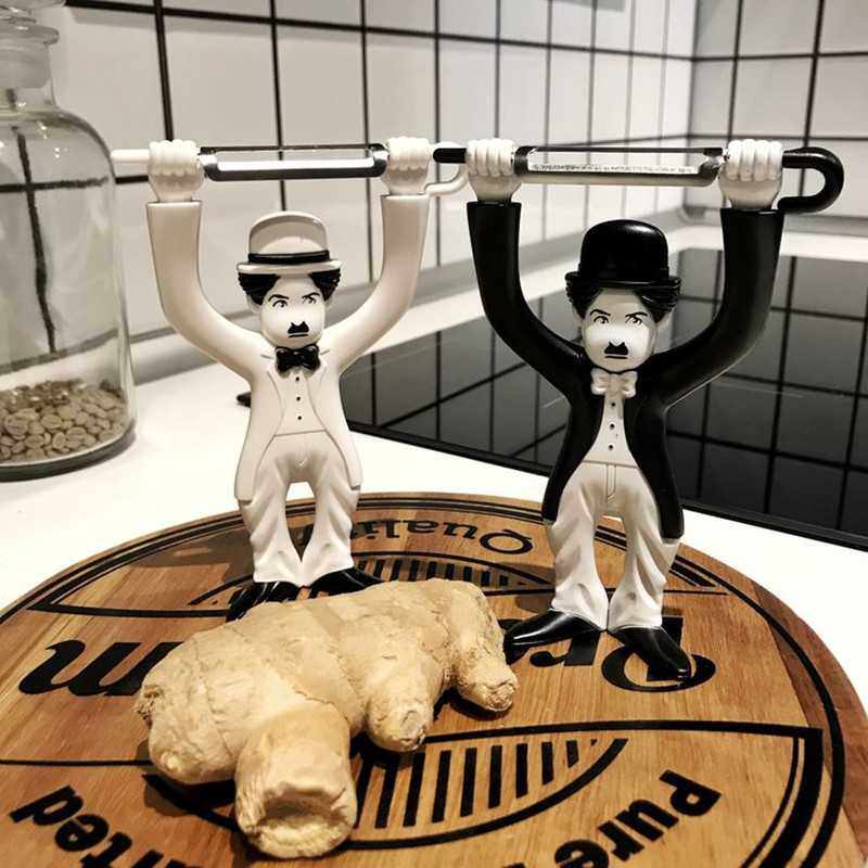 新款直销创意卓别林多功能不锈钢水果削皮刀卡通削皮器刮皮刀刨刀,家居饰品,桌面摆件,淘宝优惠券,粉丝福利购,淘宝优惠卷