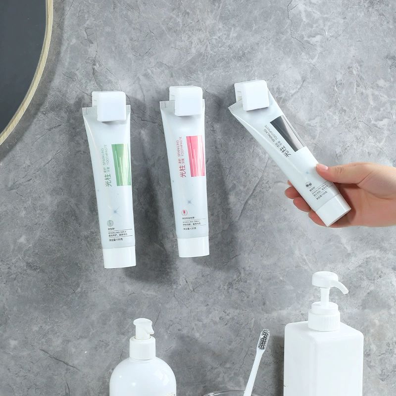 牙膏置物架挤牙膏神器卫生间壁挂式收纳夹子墙上免打孔洗面奶推夹