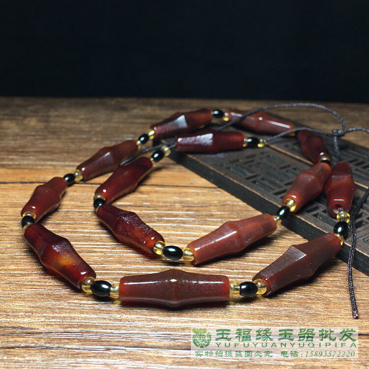 风化包浆辽金古玉六棱玛瑙老珠子