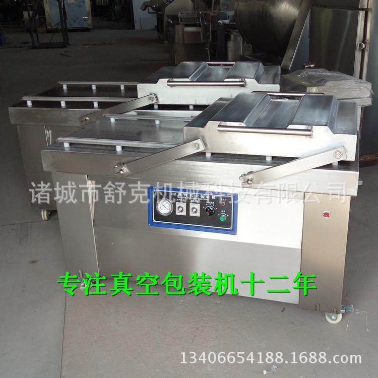 厂家供应麻辣熟食即食鸭翅真空包装机双室四封条真空包装机摆盖