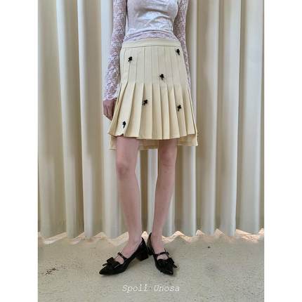 Spoii Unosa浅黄前短后长钉珠百褶半裙