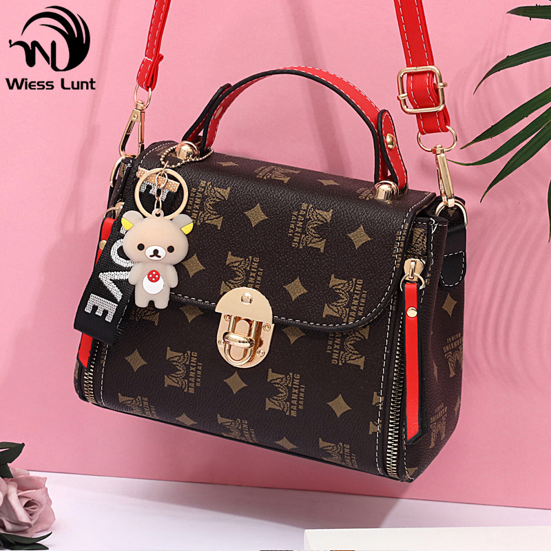 包包女2020新款旋锁气质春夏斜跨包手提单肩韩版老花印花小方包